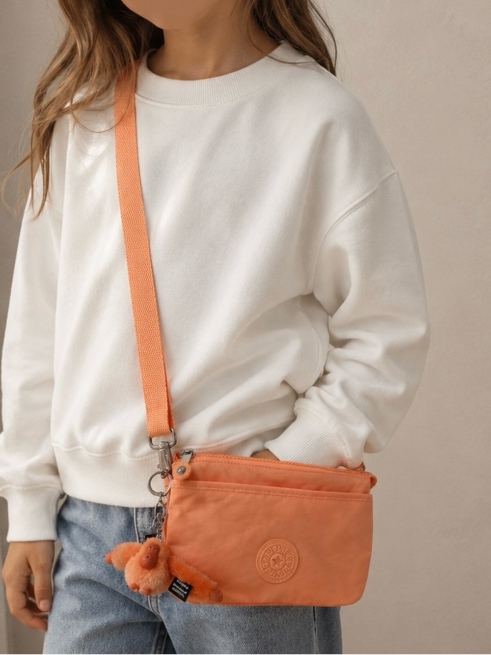 Kipling Peach Orange Crossbody Bag with Plush Monkey Charm